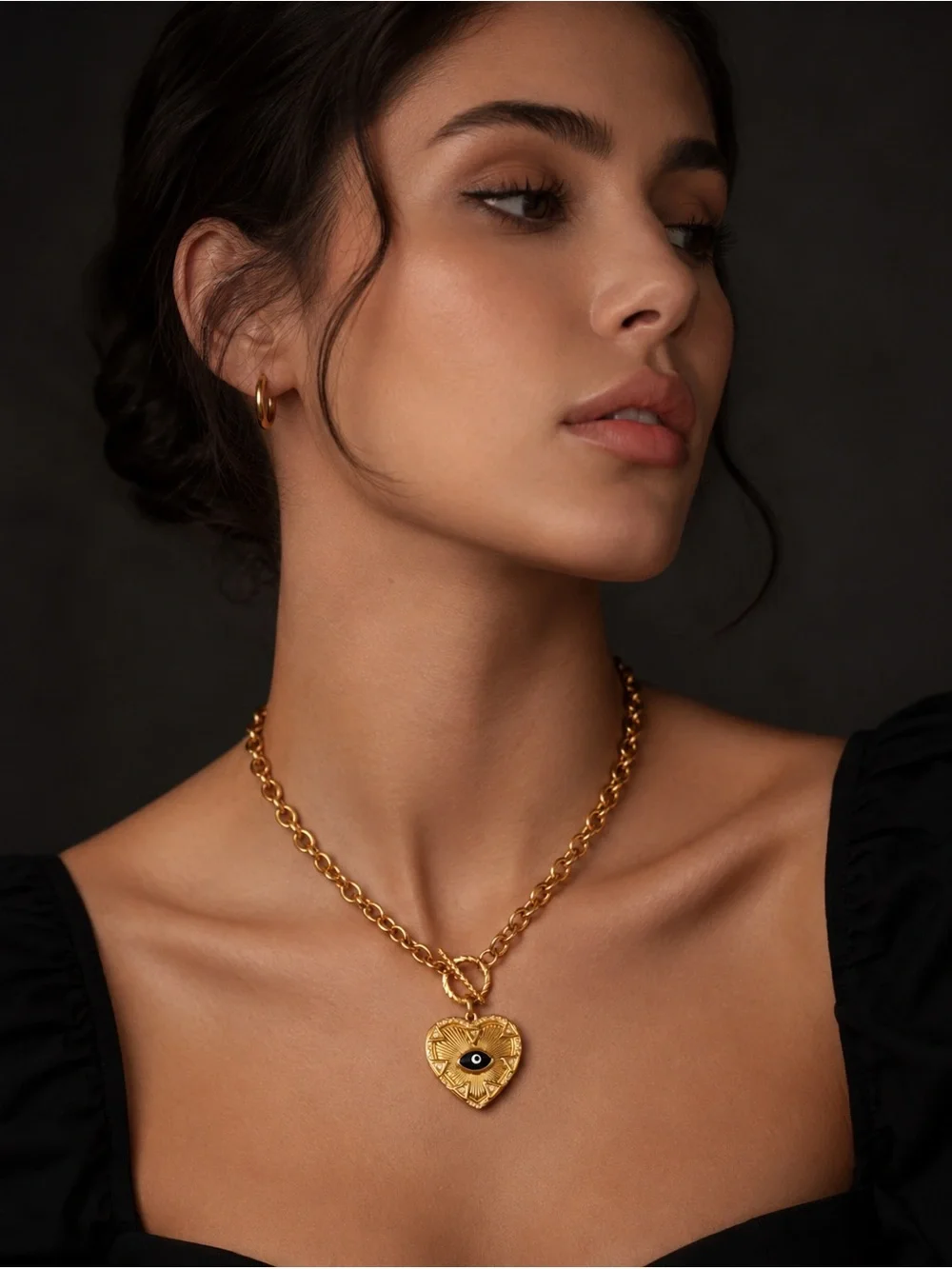 Gold Heart Toggle Necklace with Black Eye Pendant